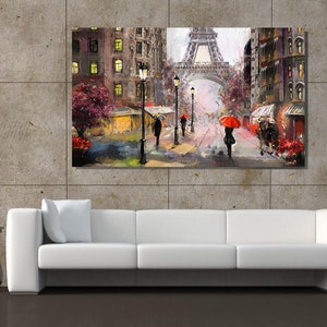 May include: A painting depicting a Parisian street scene with the Eiffel Tower in the background. The street is lined with buildings and lampposts, and people are walking under red umbrellas.