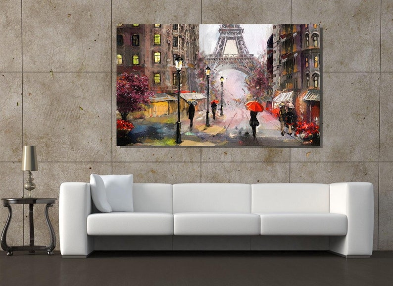 May include: A painting depicting a Parisian street scene with the Eiffel Tower in the background. The street is lined with buildings and lampposts, and people are walking under red umbrellas.