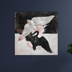 May include: An abstract painting of two swans, one white and one black, in flight. The white swan is above the black swan, with red accents on the wings. The background is split into black and white sections.