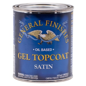 May include: A blue can of General Finishes Gel Topcoat Satin oil-based finish. The can is labeled with the company logo, product name, and size: (473 ml) 1 pint (US). A warning label states: "Combustible liquid and vapor, causes eye irritation. Carefully read all cautions on back."