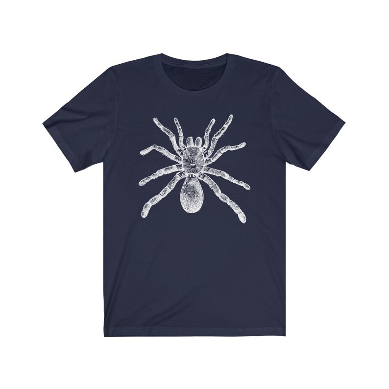 May include: A navy blue t-shirt with a white graphic of a spider.