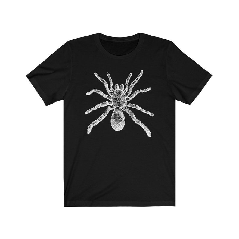 May include: Black t-shirt with a white graphic of a spider.