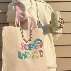 Hope World Tote Bag | removable beaded chain BTS J-hope hobi hobicore Bangtan tote bag aesthetic tote bag BTS tote bag, Hope World tote bag