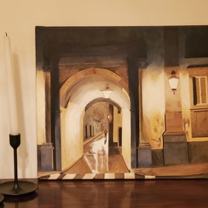 May include: A painting of a narrow, arched alleyway with a street lamp and a person walking in the distance. The alleyway is lit by a soft, warm light, and the walls are painted in shades of yellow and brown.