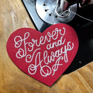 closeup of Forever and Always red heart patch