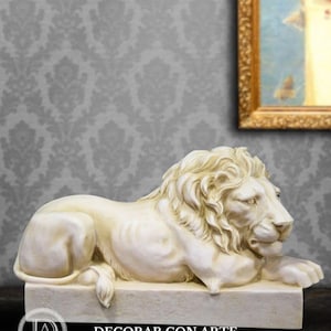Seated lion. Right. 38x16x21cm. Sculpture. Molded marble. Handmade in Spain. Art reproductions for decoration and gifts.