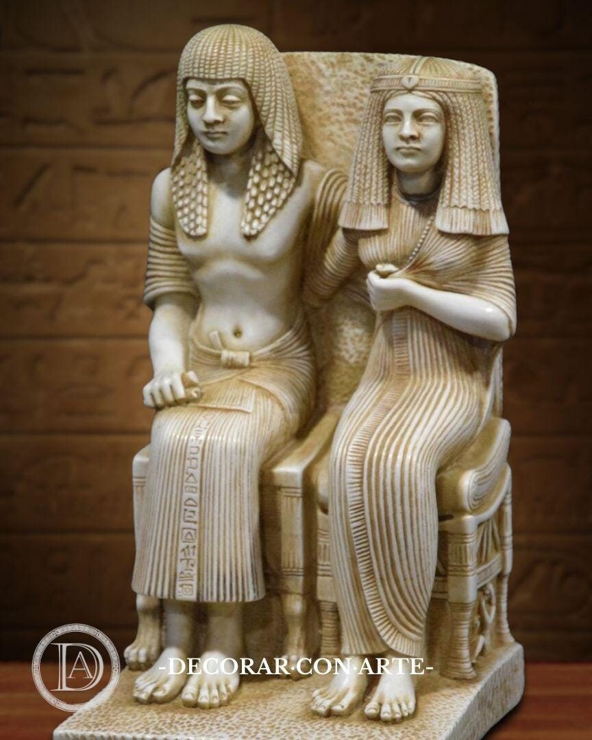 Reproduction of a figure of an Egyptian couple, made of reconstituted marble. 26 cm. Ancient Egyptian Art