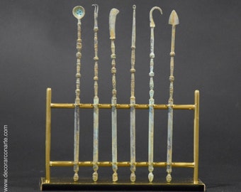 Etruscan surgical instruments. Reproduction in cast bronze. 20 cm.