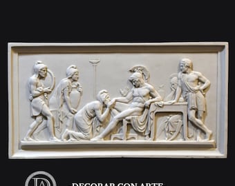 May include: An off-white rectangular relief sculpture featuring a classical scene with several figures. The figures are in different poses, including kneeling and reclining. The sculpture has a detailed surface and is framed. The text "-DECORAR.CON.ARTE-" is at the bottom.