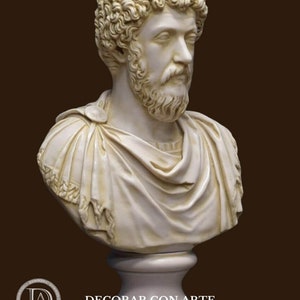 May include: A white marble bust sculpture of a man with curly hair and a beard. The bust is on a white pedestal.