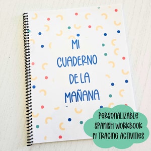 May include: A spiral-bound workbook with a white cover featuring a pattern of small yellow semicircles and multicolored dots. The text "MI CUADERNO DE LA MA&Ntilde;ANA" is printed in blue. A green cloud-shaped graphic contains the text "PERSONALIZABLE SPANISH WORKBOOK 14 TRACING ACTIVITIES".