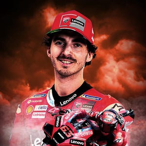 May include: A red and black motorcycle racer with the number 63 on the side. The rider is wearing a red and white racing suit and a white helmet with a black visor. The motorcycle has the word "Lenovo" on the side and the rider's name "FRANCESCO BAGNAIA" is printed below the motorcycle.