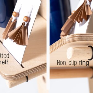 May include: A wooden jewellery stand with a slotted shelf and a non-slip ring. The stand is made of light wood and has a natural finish.