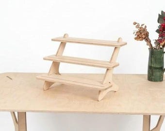 Pebble Step, wooden shelf, tiered display, retail display, collapsible stand, market stall, retail shelves, craft fair, vendor stand
