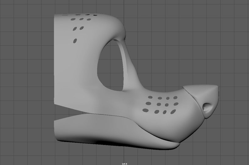 May include: A 3D model of a furry muzzle with a textured nose and holes around the mouth and eyes.