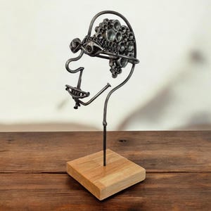 Industrial Metal Head Sculpture: Handcrafted Art on Irish Oak