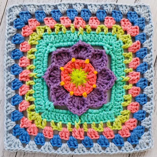 Coffs Bloom | Granny square pattern, Floral granny square, Granny square flower, Crochet pattern squares for blankets, granny square crochet