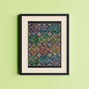 May include: Framed cross-stitch artwork with a floral design in a grid of colourful octagons. The artwork is in a black frame with a cream-coloured mount, set against a light green background.