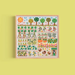 May include: Cross-stitch artwork of a colorful garden scene. The design features a sunny sky, trees, various vegetables, and a chicken coop. The artwork is framed in a light wood frame, perfect for home decor.