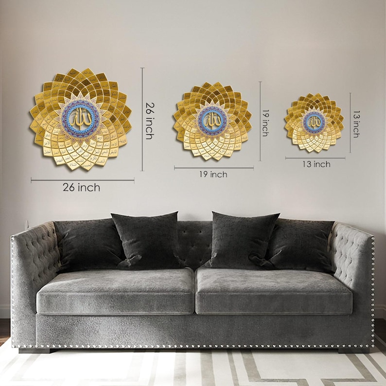 May include: Three gold-colored, flower-shaped wall decorations with Arabic calligraphy. The largest is 26 inches in diameter, the middle one is 19 inches, and the smallest is 13 inches. Each has a blue and gold center. They are displayed above a gray sofa.