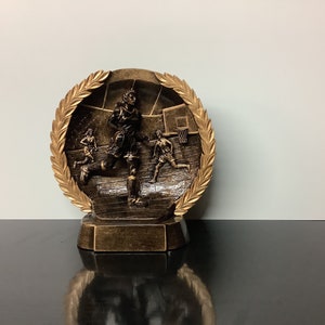 Girls/Female Basketball Resin Trophy.