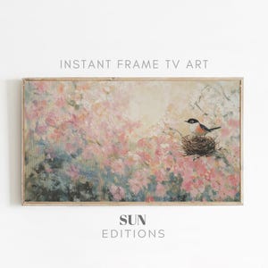May include: A framed painting of a bird sitting in a nest in a field of pink flowers. The painting has a soft, dreamy feel and is perfect for adding a touch of nature to your home decor.