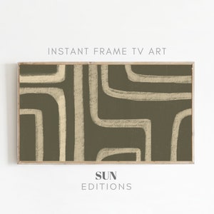 May include: Abstract geometric art print with a green background and beige lines. The print is framed in a light wood frame. The text "SUN EDITIONS" is below the frame.