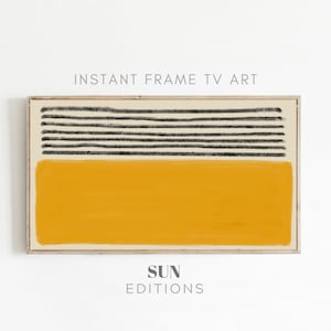 May include: Abstract art print with a yellow rectangle and black horizontal lines on a cream background. The print is framed in a light wood frame. The text "SUN EDITIONS" is below the print.