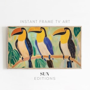 May include: A painting of three toucans with yellow beaks and black bodies perched on a branch. The toucans are surrounded by green leaves and a light blue sky. The painting is framed in a light wood frame.