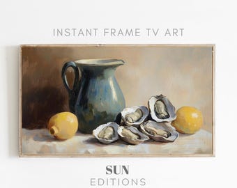 May include: A still life painting featuring a blue pitcher, oysters, and lemons. The artwork is framed and includes the text "INSTANT FRAME TV ART" and "SUN EDITIONS". The color palette is dominated by blues, yellows, and browns.