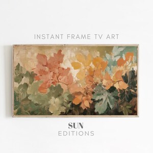 May include: A framed abstract painting featuring a colorful floral design with shades of pink, orange, yellow, and green. The painting has a vintage aesthetic and is perfect for adding a touch of art to any room.