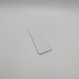 Invisible holder for the Philips Hue Dimmer Switch v2. Magnetic holder for the dimmer, fastened using NanoTape. image 6