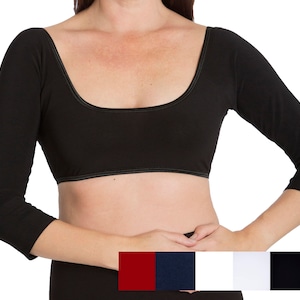 May include: Black long-sleeved crop top with a scoop neckline. The top has a fitted design and is made of a soft, stretchy fabric. The image also shows a color palette of red, navy, white, and black.