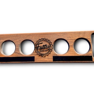 May include: Wooden beer caddy with four bottle holders and a black chalkboard insert. The caddy is engraved with the words "Fattey Brew Co."