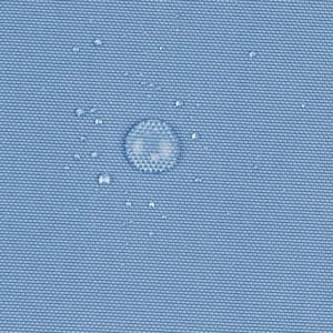 May include: A light blue, tightly woven fabric surface featuring a visible grid-like texture. Several clear water droplets of varying sizes are scattered across the material, demonstrating a water-repellent or hydrophobic quality.