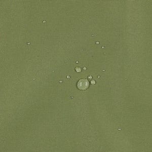 May include: A solid olive green fabric surface with a tight, woven texture. Several clear water droplets of varying sizes are scattered across the material, demonstrating a water-repellent quality on the textile's surface.