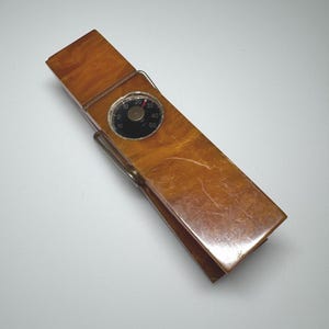 Porta carta con clip in catalina di bachelite antica da 183 grammi.