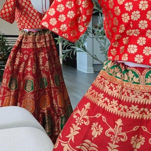 Banaras lehanga in red greenand gold with brocade weaving throughout w/stitched blouse size 34-42 adjustable