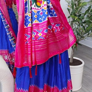 Lehanga/half saree for navratri festivals ikkat patola print floral border with gold foil print blouse size 34 flared skirt blue pink