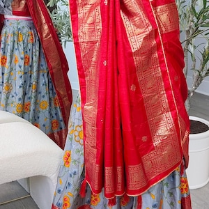 Lehanga/half saree for navratri festivals floral print floral border with gold foil print blouse size 34 with margin grey and red