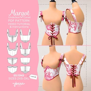 Pode incluir: Molde PDF, tutorial em vídeo e instruções para espartilho sob o busto Margot. A peça apresenta uma estampa toile branca e rosa com alças, amarração frontal e traseira com fitas rosa escuro, disponível nos tamanhos 2XS-3XL.