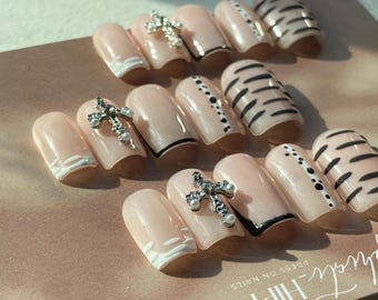 Black and White with Animal Print and 3D Design and Cross Charm Press on Nails in a Size Large 0,4,3,5,7