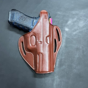 Kabura skórzana K036-G Pancake z regulowanym paskiem bezpieczeństwa, z blokadą kciuka, prawa, pasuje do pistoletów GLOCK 17 19 22 23 Ręcznie wykonana!