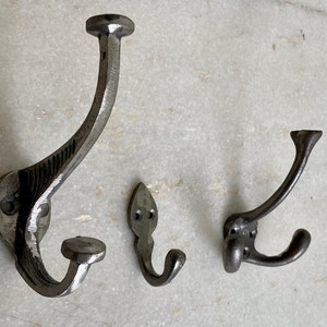 Cast iron hooks, iron coat hangers, wall hooks, Iron hat and coat hooks, kitchen hooks and hangers, towel hooks, hooks for wall