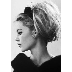 May include: Black and white portrait photograph of a woman with a bouffant hairstyle wearing a black fur collar. The image is 60 x 90 cm or 24 x 36 inches.
