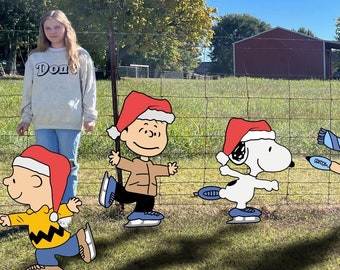 Cartoon crew ice skating scene. Christmas Yard Decorations. Christmas Display.