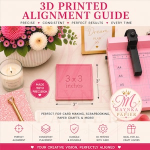 May include: A square pink 3D printed alignment guide measuring 3 by 3 inches. The tool features embossed text indicating its dimensions. It is designed for paper crafting tasks, providing a consistent surface for precise placement and alignment.