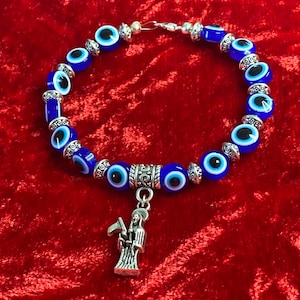 Santa Muerte Evil Eye Beaded Bracelet| Mini Santa Muerte Pendant| Handmade Evil Eye Beaded Bracelet