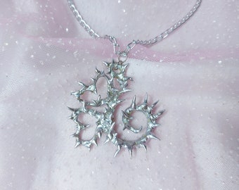 Spiky metal grunge charm necklace