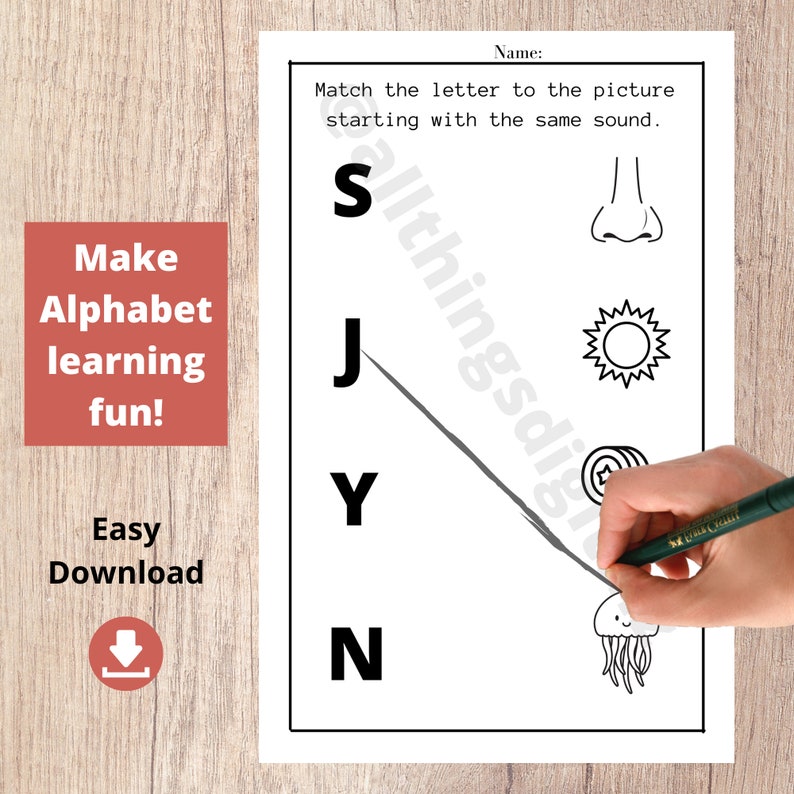 May include: Black and white printable worksheet for children to match letters to pictures. The letters are S, J, Y, and N. The pictures are a nose, sun, jellyfish, and a target.